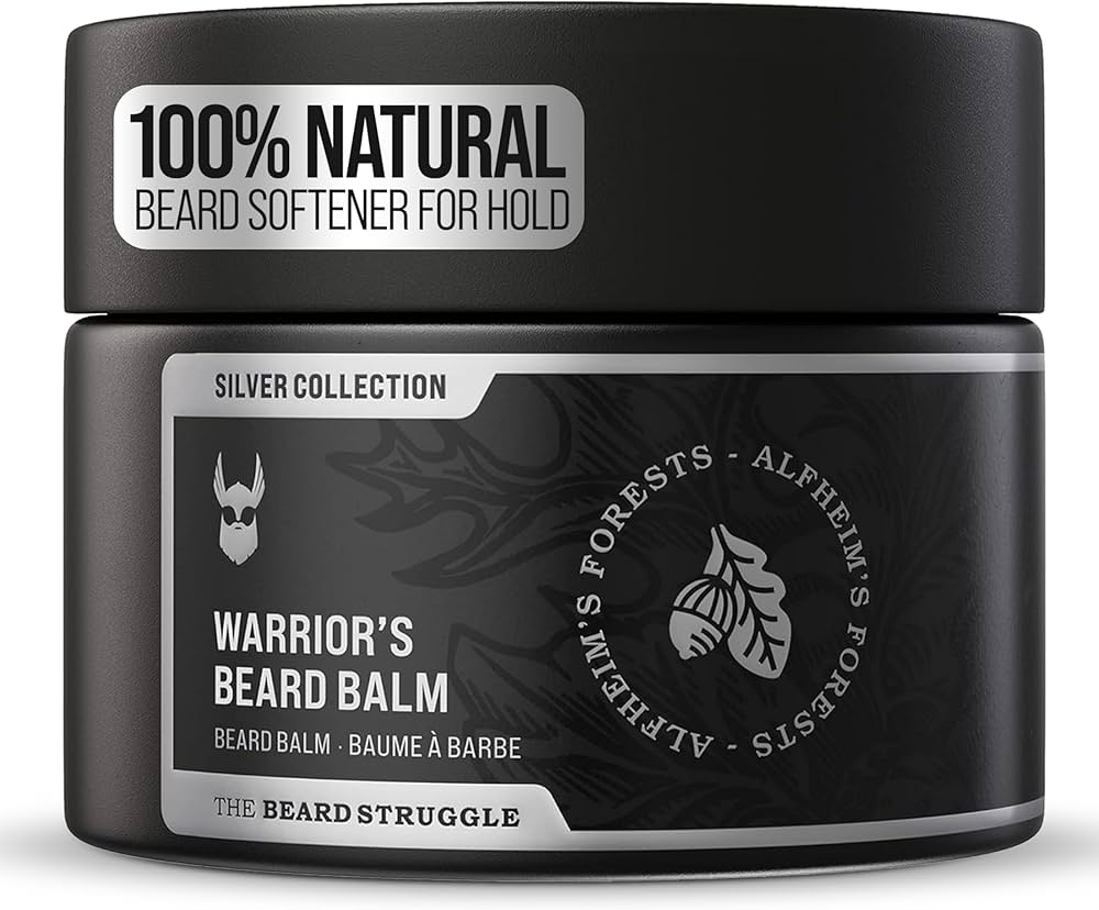 Szczotkowanie brody dla idealnego wykończenia Mężczyzna czeszący brodę szczotką po aplikacji balsamu